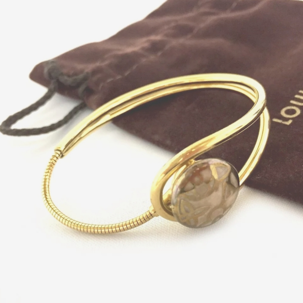 LOUIS VUITTON CELESTE MAGNET GOLD TONE BRACELET - Picture 3 of 16